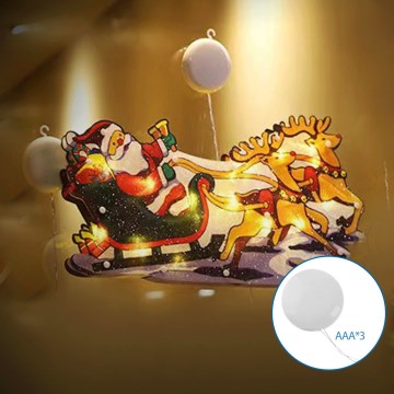 Aigostar - Décoration de Noël LED/3xAAA Père Noël et ses rennes 13,4cm