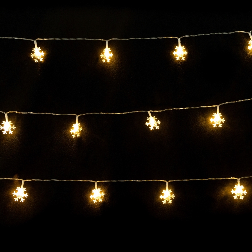 Aigostar - Guirlande LED 10xLED/3xAA, 1,5 m, blanc chaud, à motifs flocons