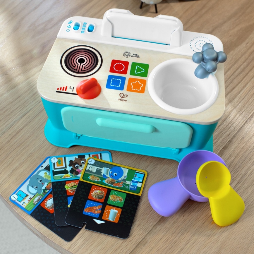 Baby Einstein - Cuisinette musicale MAGIC TOUCH, fonctionne avec 3 piles AA