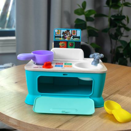 Baby Einstein - Cuisinette musicale MAGIC TOUCH, fonctionne avec 3 piles AA