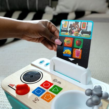 Baby Einstein - Cuisinette musicale MAGIC TOUCH, fonctionne avec 3 piles AA