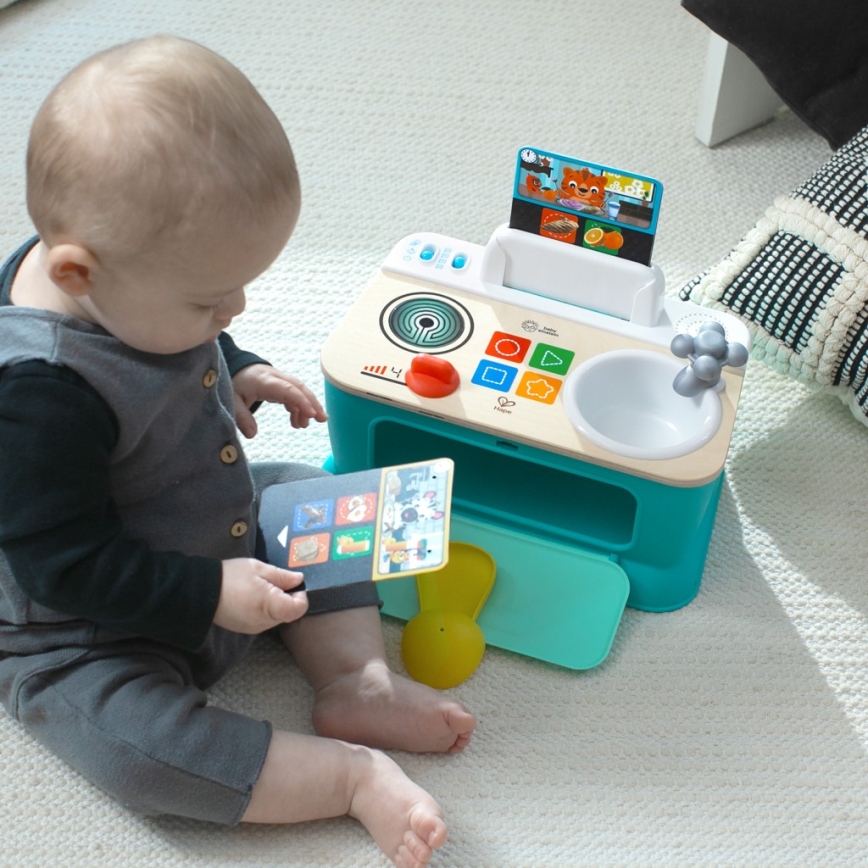 Baby Einstein - Cuisinette musicale MAGIC TOUCH, fonctionne avec 3 piles AA