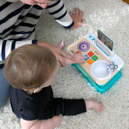 Baby Einstein - Cuisinette musicale MAGIC TOUCH, fonctionne avec 3 piles AA