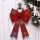 Décoration de Noël LED RVB 11xLED/3xLR44 40x30 cm nœud rouge