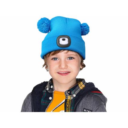 Extol - Bonnet enfant avec lampe frontale intégrée, batterie rechargeable 250 mAh via USB, bleu à pompons