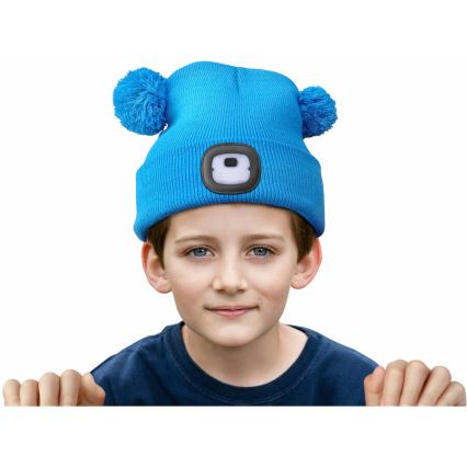 Extol - Bonnet enfant avec lampe frontale intégrée, batterie rechargeable 250 mAh via USB, bleu à pompons
