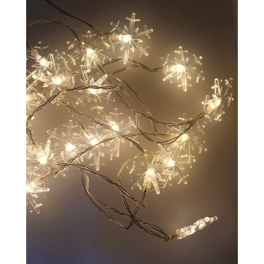 Guirlande lumineuse LED de Noël pour extérieur, 20 LED, alimentée par 2 piles AA, 2,2 m, IP44, blanc chaud, motif flocons de neige