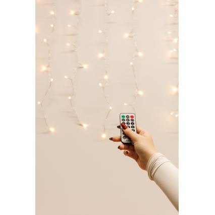 Rideau lumineux LED dimmable de Noël pour extérieur CURTAIN 360xLED/8,4W/230V 2x2 m IP44 blanc chaud + télécommande