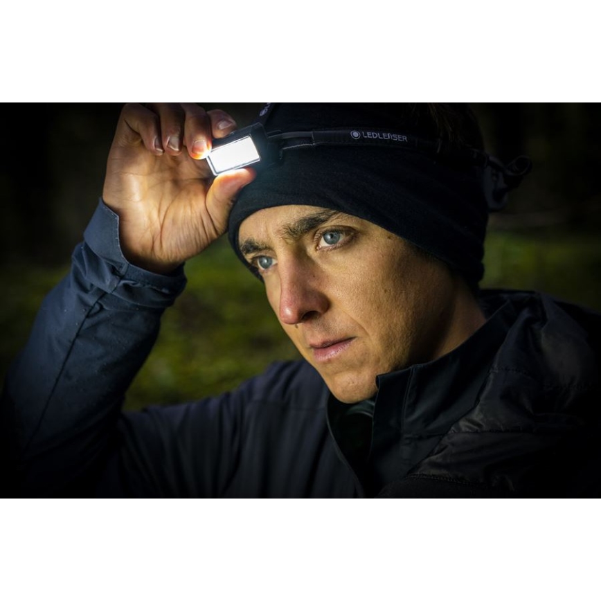 Ledlenser NEO9R - Lampe frontale rechargeable à LED à intensité réglable LED/5000 mAh IP54 1200 lm 120h noir/bleu