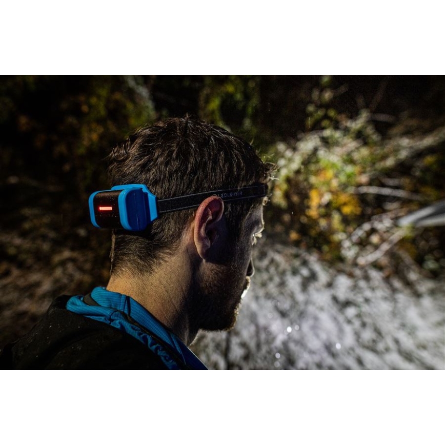 Ledlenser NEO9R - Lampe frontale rechargeable à LED à intensité réglable LED/5000 mAh IP54 1200 lm 120h noir/bleu