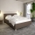 Lit tapissé avec coffre de rangement et matelas DALMA 140x200 cm gris/marron