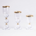 Lot de 3 bougeoirs dorés et transparents