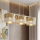 Lustre sur câble LUX 3xE27/15W/230V blanc/doré