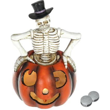 Décoration HALLOWEEN LED/2xLR44/blanc chaud squelette dans une citrouille résine