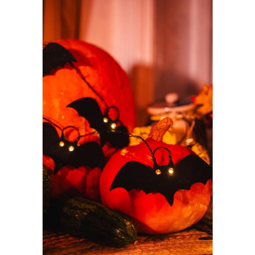 Guirlande décorative HALLOWEEN 10xLED/2xAA/blanc chaud 1,3m chauves-souris