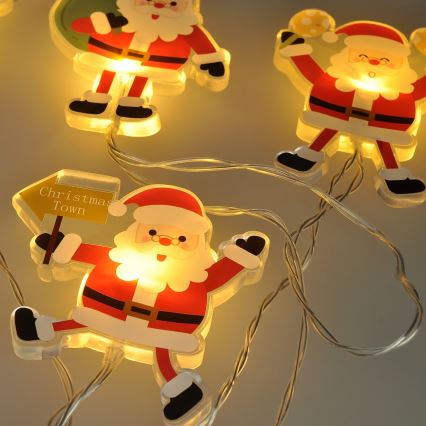 Guirlande de noël LED avec ventouses 6xLED/2xAA 1,2m blanc chaud Père Noël